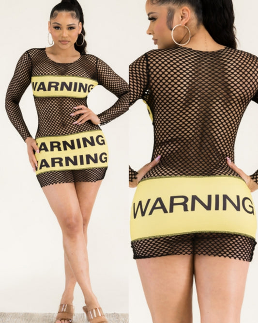 She comes with a warning label